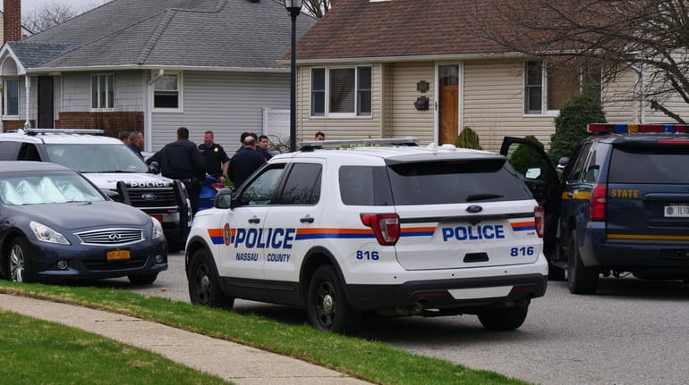 Police converge on a Wantagh street where Nicholas V. Hollifield of East Islip...