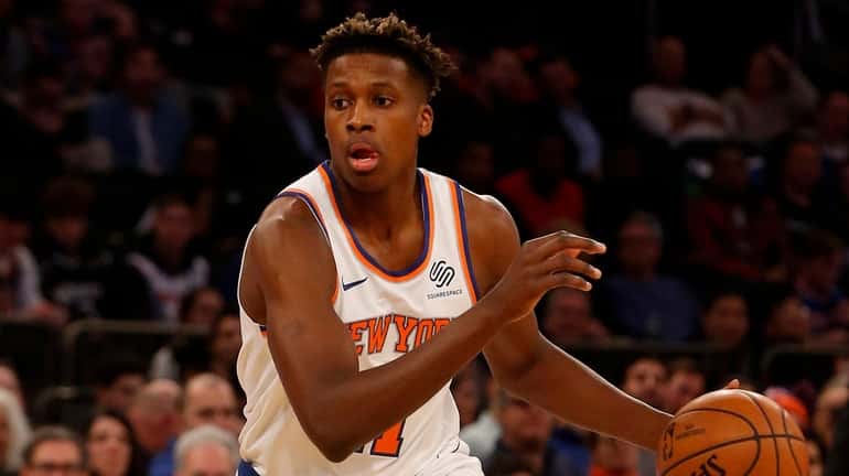 Frank Ntilikina of the Knicks controls the ball during the second...