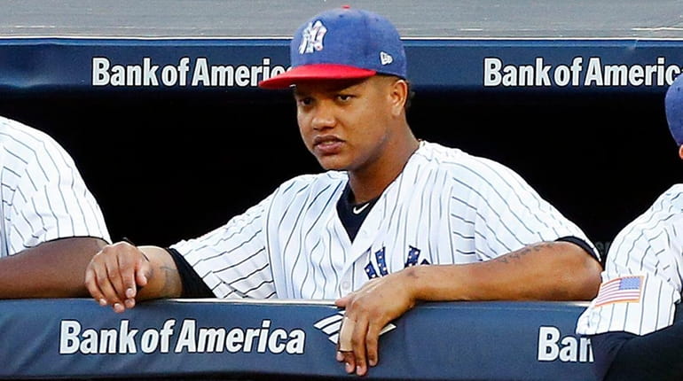 Starlin Castro #14 of the Yankees looks on during the...