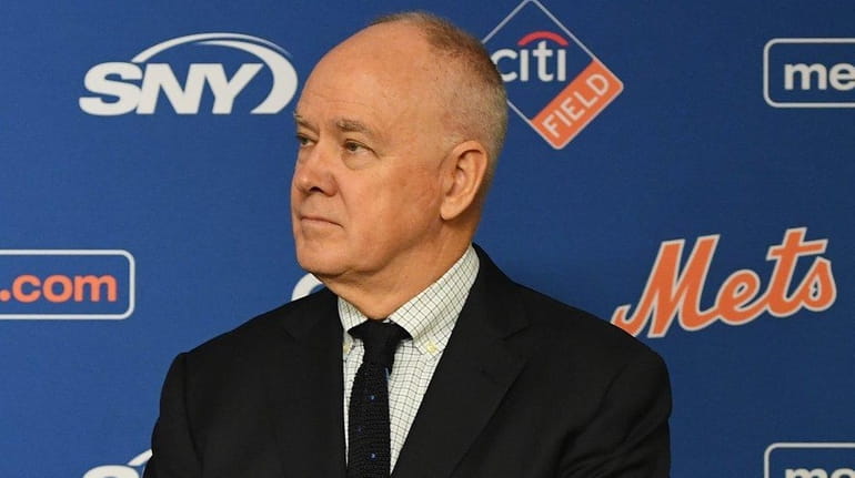Mets general manager Sandy Alderson looks on during a press...