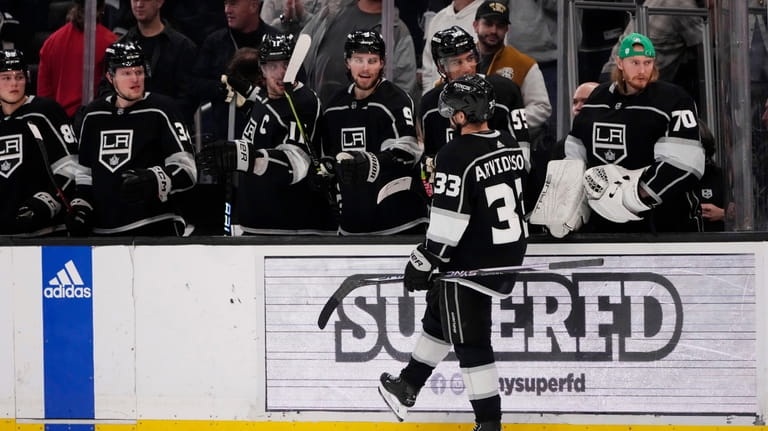 Los Angeles Kings right wing Viktor Arvidsson (33) is congratulated...