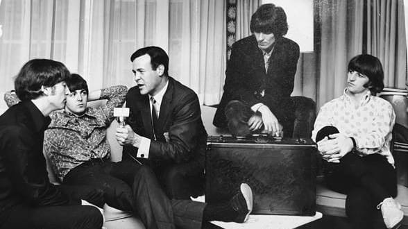 Cousin Brucie interviews The Beatles  in their hotel room in 1964.