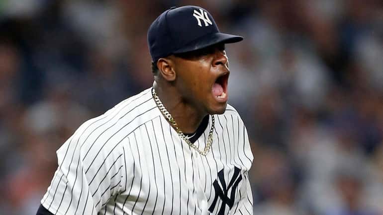 Yankees pitcher Luis Severino reacts after the final out of...