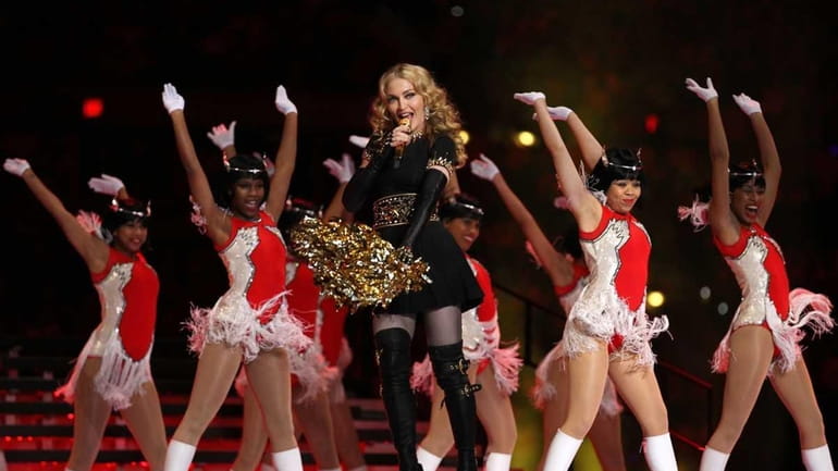 Singer Madonna performs with M.I.A. and Nicki Minaj during the...