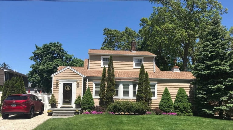 This East Norwich Colonial is listed for $589,000.