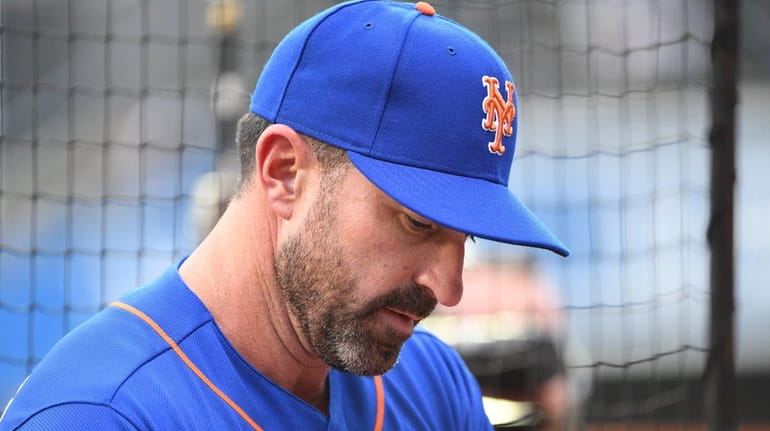 Mets manager Mickey Callaway looks on before a game against...