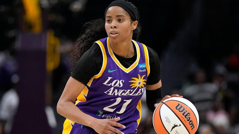 Los Angeles Sparks guard Jordin Canada dribbles during the second...