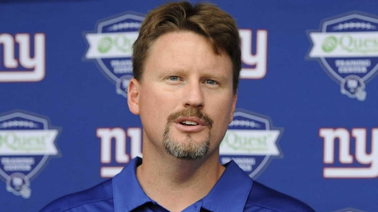 New York Giants offensive coordinator Ben McAdoo answers questions from...