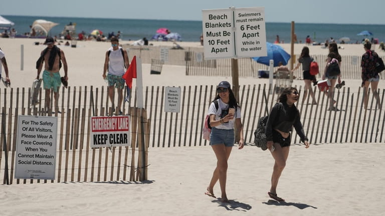 Thousands gather at the shoreline at Jones Beach this past weekend.