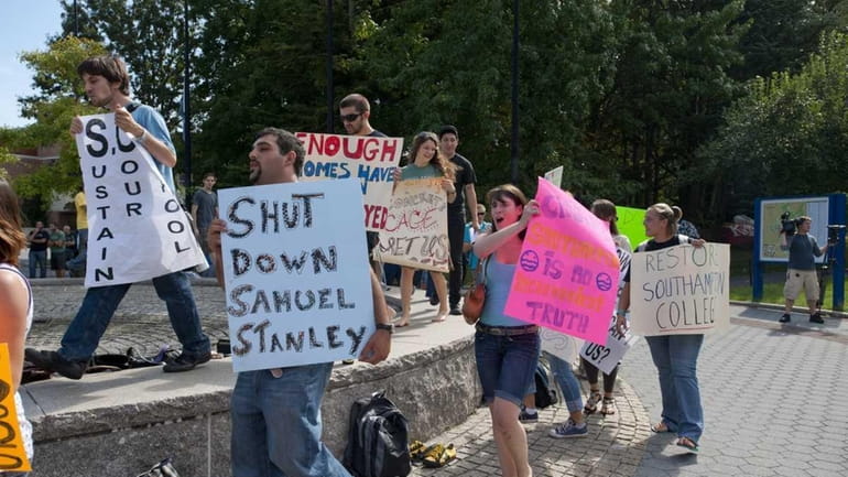 Students at Stony Brook University rally in front of the...