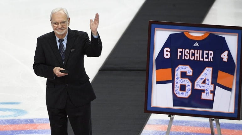 MSG broadcaster Stan Fischler is honored before an NHL hockey...