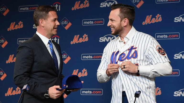 Mets general manager Brodie Van Wagenen welcomes Jed Lowrie to...