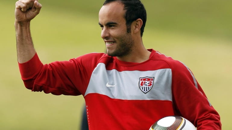 Landon Donovan holds up his fist during training at Pilditch...
