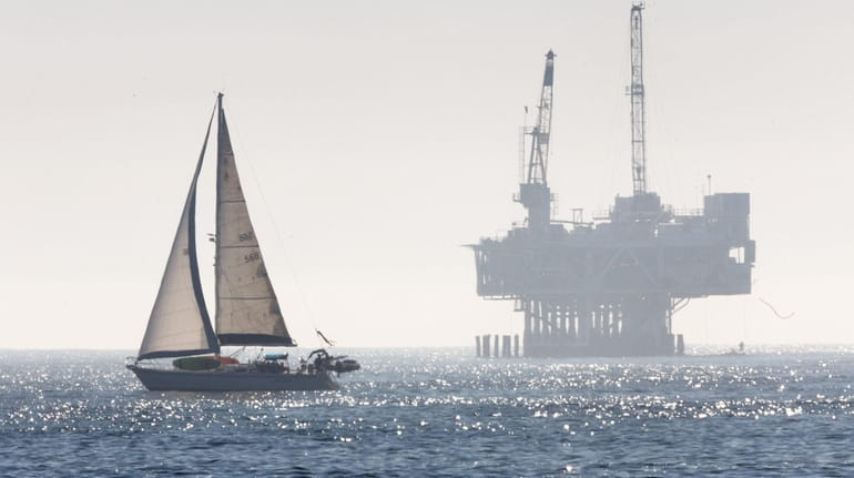 An oil drilling rig is seen in the Pacific Ocean...