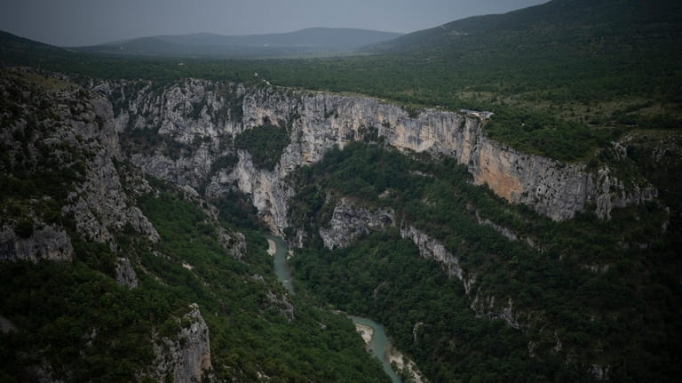 The Verdon River snakes through a gorge in southern France,...