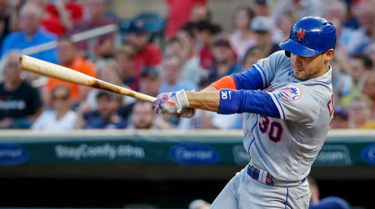 Mets' Michael Conforto hits an RBI single against the Minnesota...