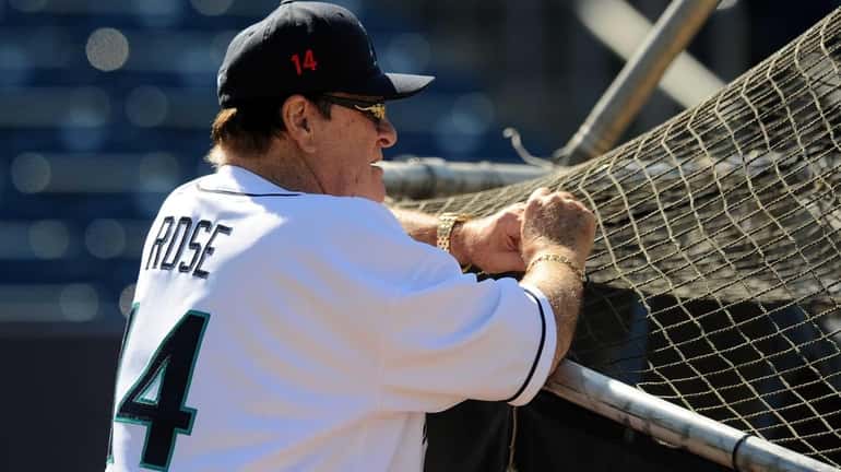 Former Major League Baseball player Pete Rose looks on during...