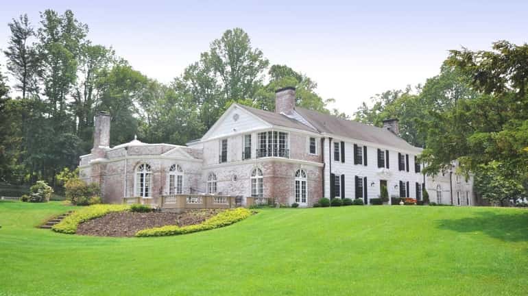 This Mill Neck estate, on the market for $3.3 million,...