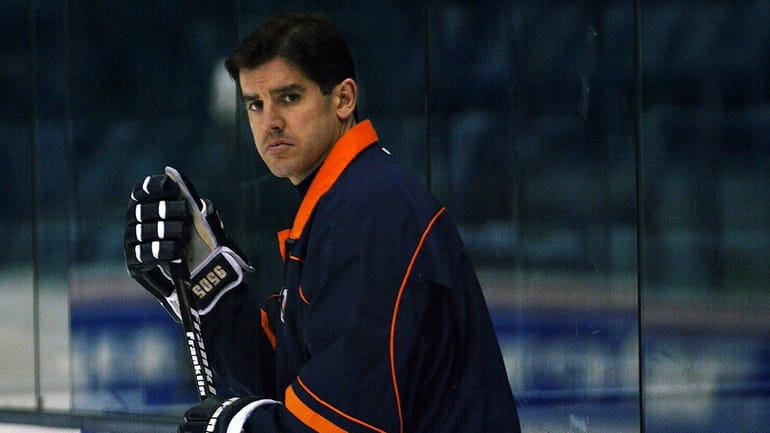 Then-Islanders head coach Peter Laviolette watching practice in 2002 at...