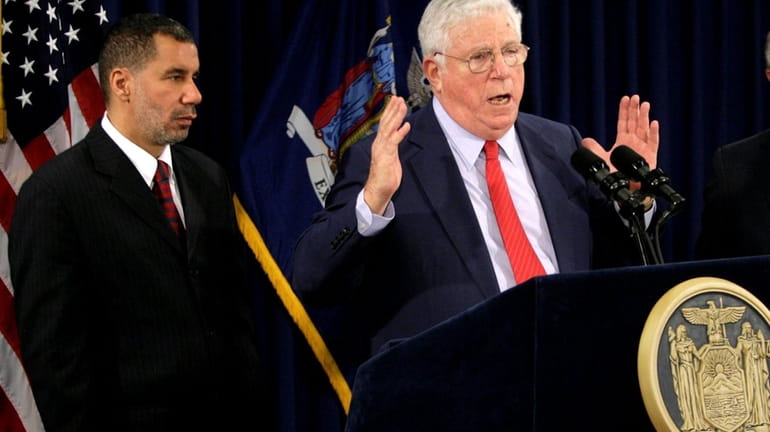 Richard Ravitch speaks as Gov. David A. Paterson look on...