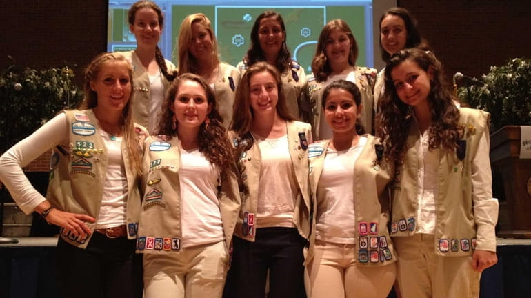Ten of the 11 Manhasset Troop 522 Girl Scouts who...
