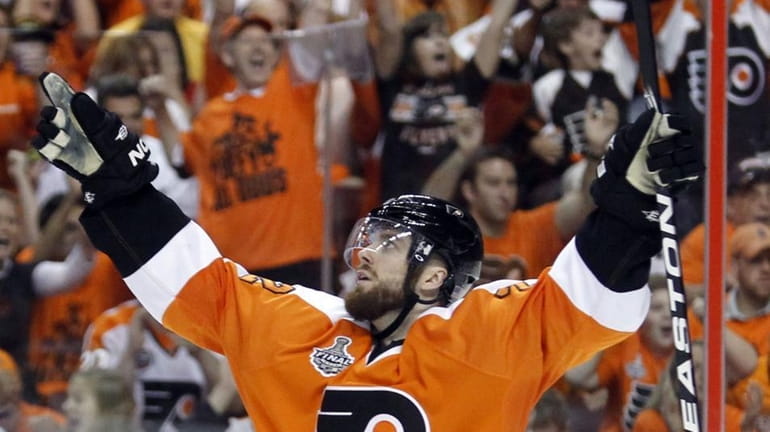 Philadelphia Flyers' Leino Ville celebrates his third-period goal in Game...