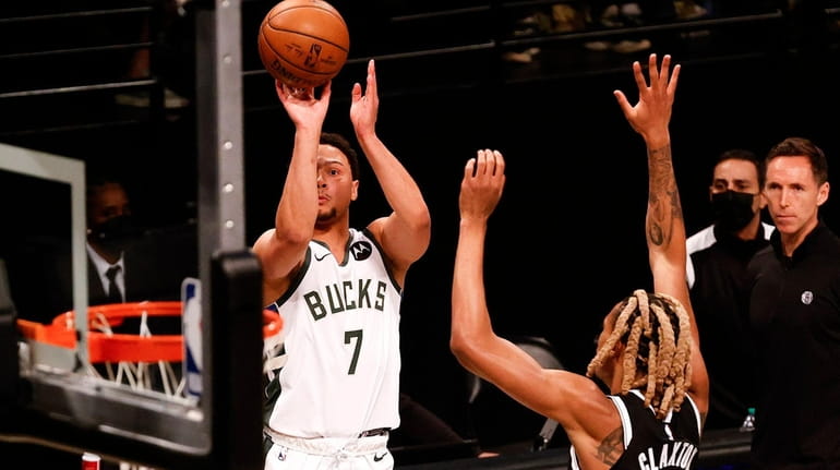 Bryn Forbes of the Milwaukee Bucks shoots during the first...