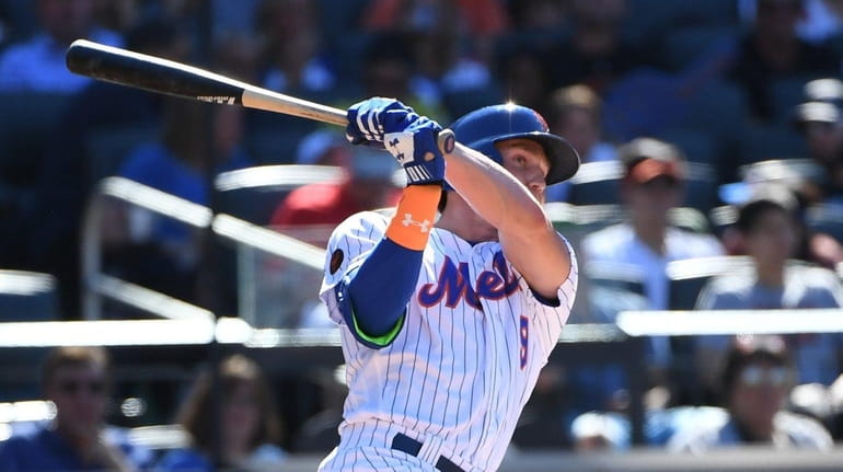 Mets' Brandon Nimmo doubles against the Tampa Bay Rays during...