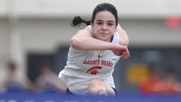 Brigid Byrnes of Sacred Heart Academy races to victory in...