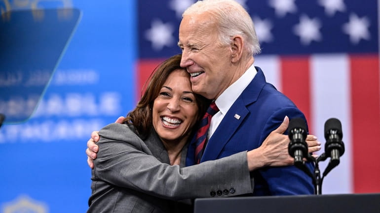 Vice President Kamala Harris embraces President Joe Biden after a...