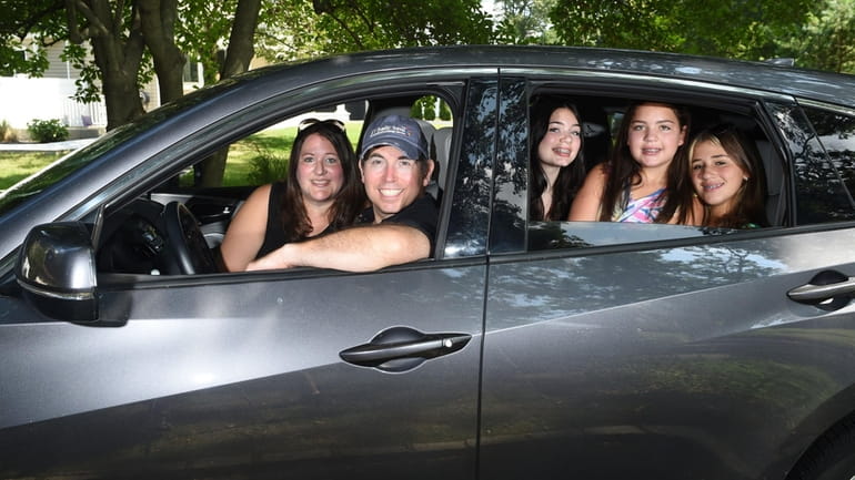 Barry Steinberger, his wife Robin, their two girls and another...