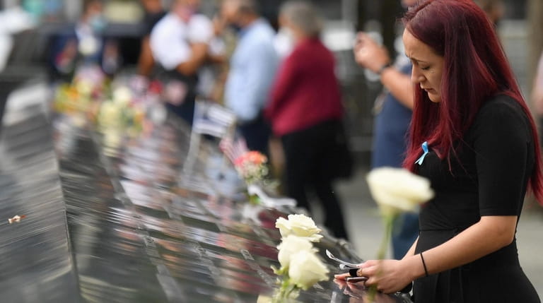 Mourners gather at the 9/11 Memorial & Museum in Manhattan...