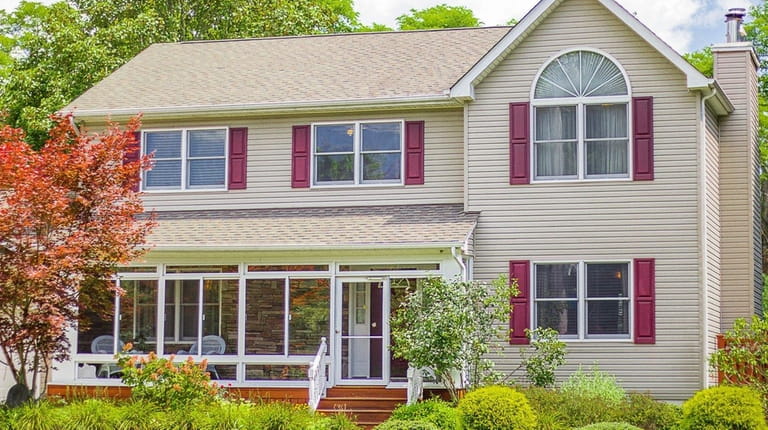 This Center Moriches Colonial, is listed for $399,000 in March...