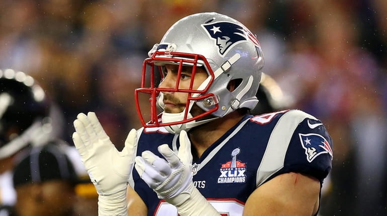 Nate Ebner #43 of the New England Patriots reacts after...