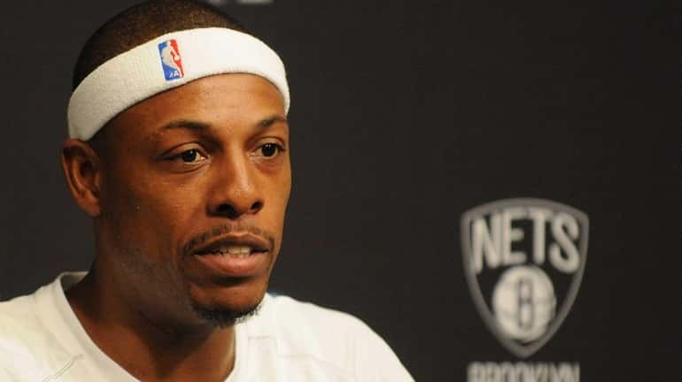 Paul Pierce speaks to reporters during the Nets' media day...