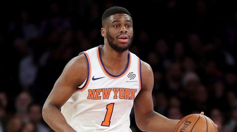 Emmanuel Mudiay of the Knicks controls the ball against the...