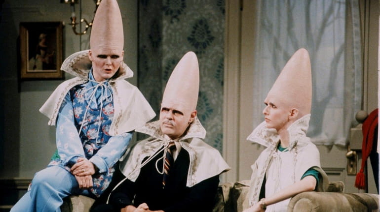 The Conehead family -- Jane Curtin, left, Dan Aykroyd and...