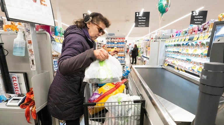 Wendy Hunter uses plastic bags at Stop & Shop in West...