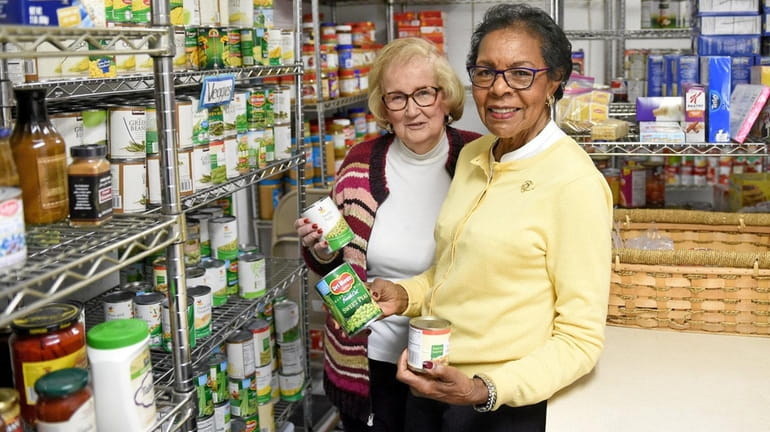 Chestene Coverdale, right, executive director of the Greater Sayville Food...