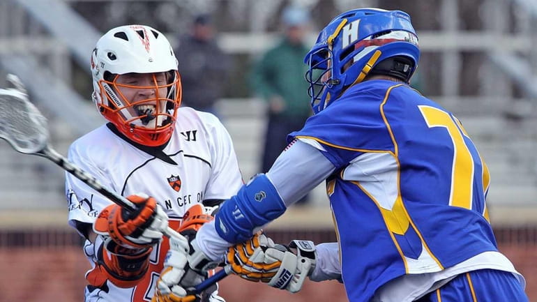 Princeton's Tom Schreiber tries to block a shot by Hofstra's...