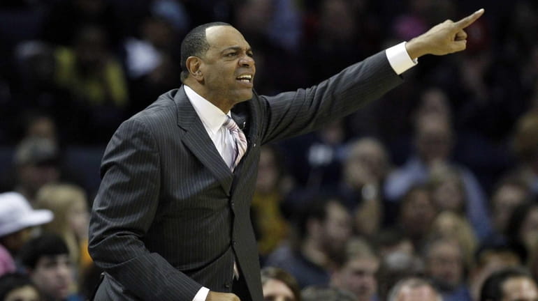 Memphis Grizzlies coach Lionel Hollins shouts during the first half...