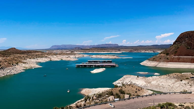 Low water levels are seen at Elephant Butte Reservoir near...