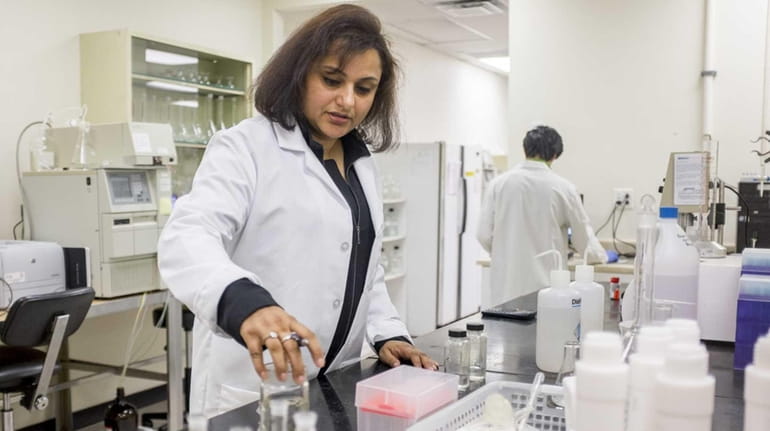 Monica Bhasin, owner of Health Level One, inside her lab...
