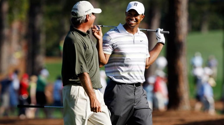 Mark Herrmann writes that as soon as Tiger Woods, right,...