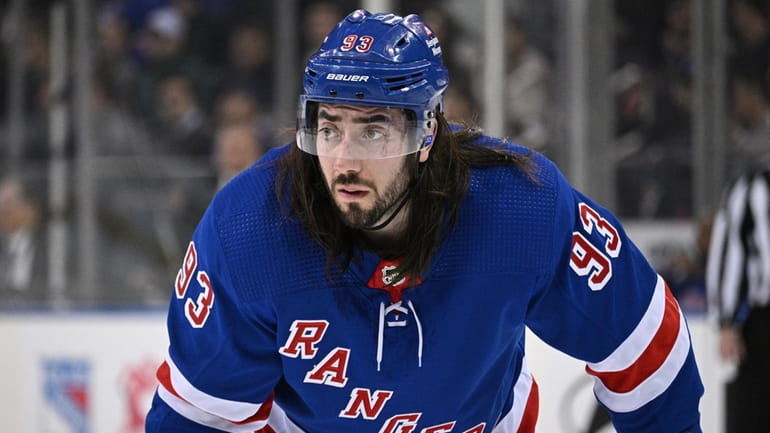 Rangers center Mika Zibanejad looks on before a face-off against...