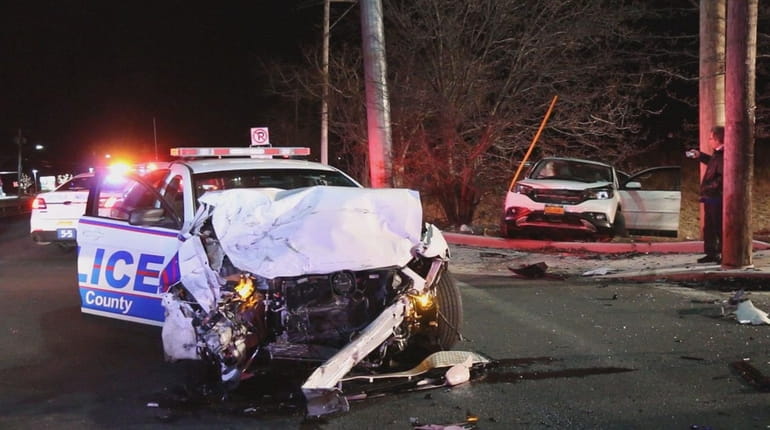 A Suffolk County police officer suffered minor injuries when his...