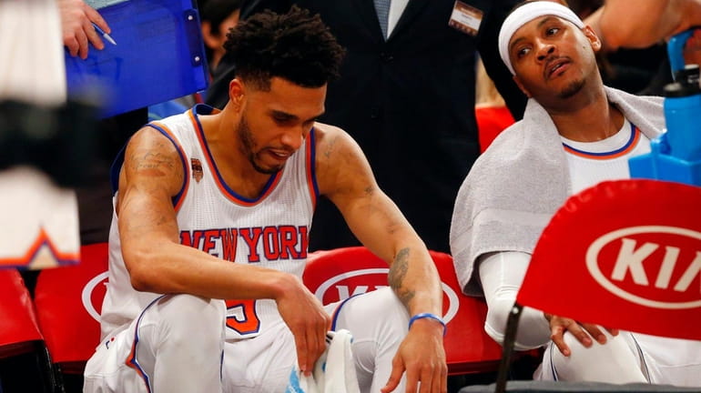 Courtney Lee and Carmelo Anthony of the New York Knicks...