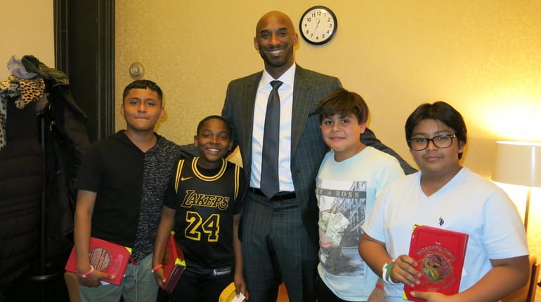 NBA Hall of Famer Kobe Bryant with Kidsday reporters, from...