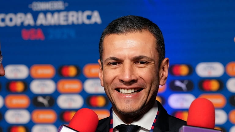 Mexico head coach Jaime Lozano talks to journalists prior to...