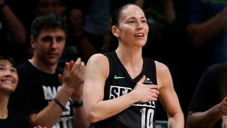 Storm guard Sue Bird acknowledges fans during the second half against...